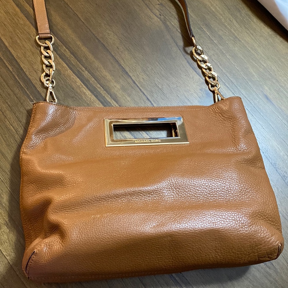 Michael Kors brown leather purse with removable strap.